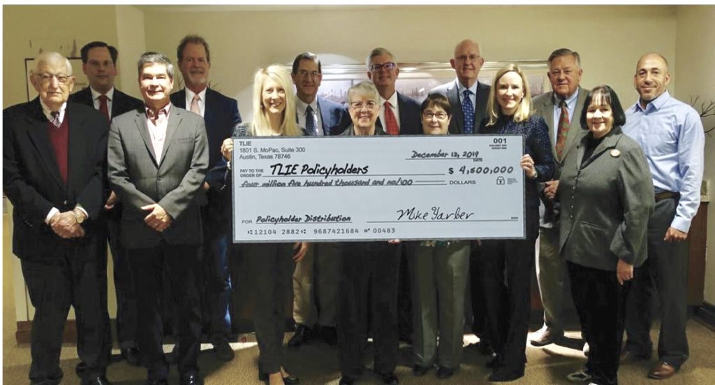 TLIE Board of Directors holding Distribution Check for 2019